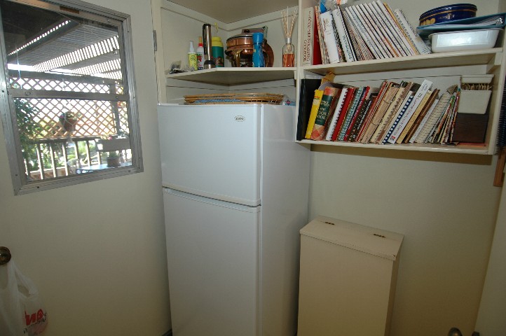 On the other side of the wall... the Laundry Room and the door goes into the laundry chute shown...