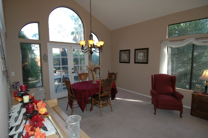 Formal Dining with French Doors to the Gardens