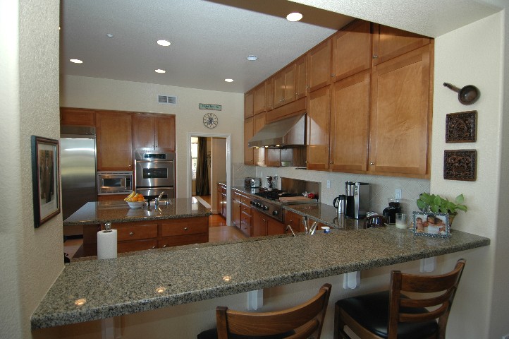 Convenient Kitchen... Family Room Pass through...