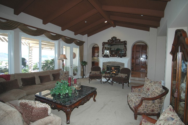 A Wall of windows to the Panoramic Views... and Private yard...