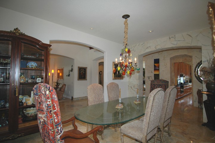 Formal Dining... with a Peek of the Library across the entry...