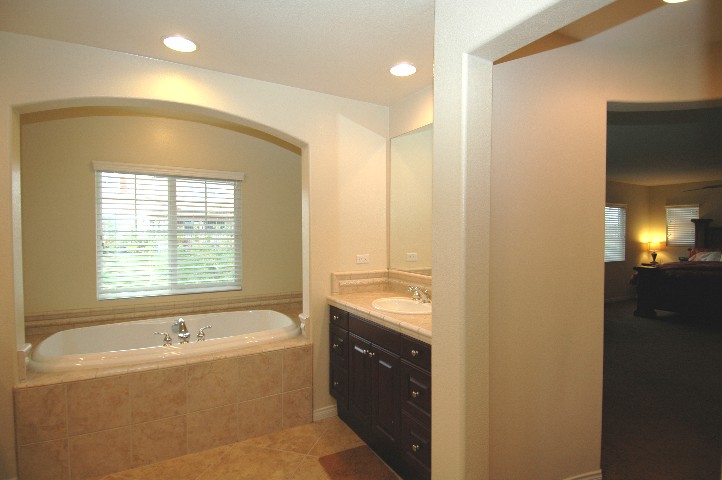 Dual Vanities.. just Elegant... and peek back to Master Suite....