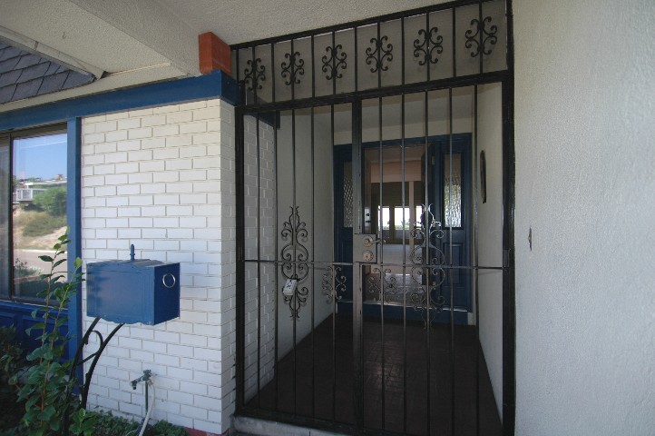 Charming and Secure gated courtyard entry...