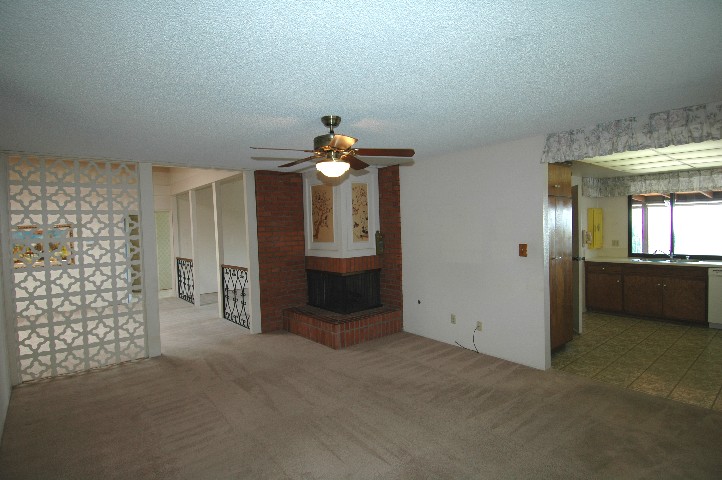 Wonderful Family Room centered on corner Masonry Fireplace...