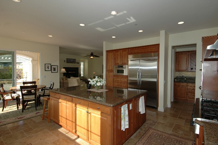 Miles of Custom Cabinets topped with Acres of Slab Granite