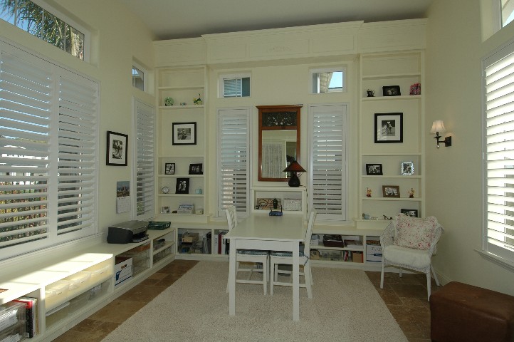Work or play... this is a wonderful space with Built in Bookcases and Storage