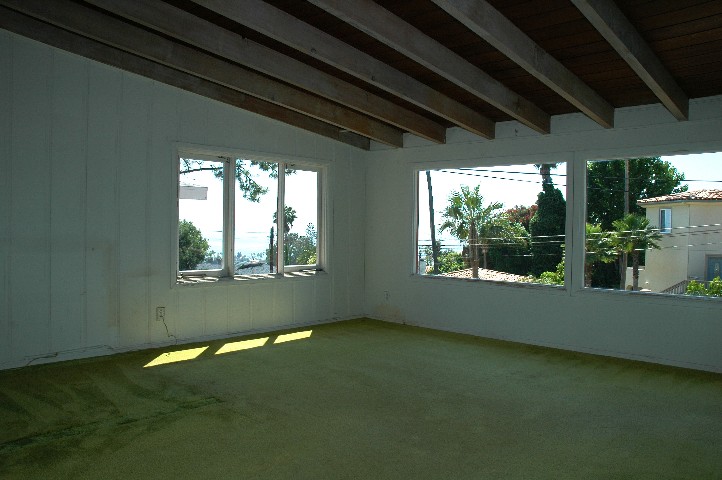 Master Suite with Classic Corner Windows and Panoramic Ocean Views