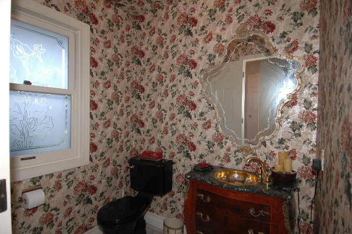 Before we leave the formal Space... note the Powder Room .... with 24Kt. Gold plated sink... and ectched Gerlach Windows..