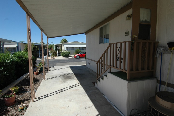 Spacious Carport with this San Marcos Mobile Home for Sale