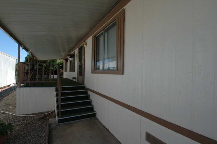 Just a few steps to this San Marcos Mobile Home for Sale