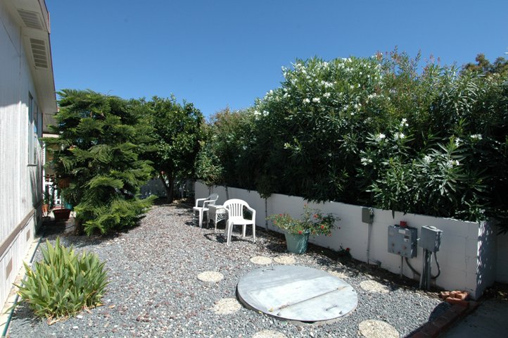 Low Maintenance Yard in this San Marcos Mobile Home for Sale