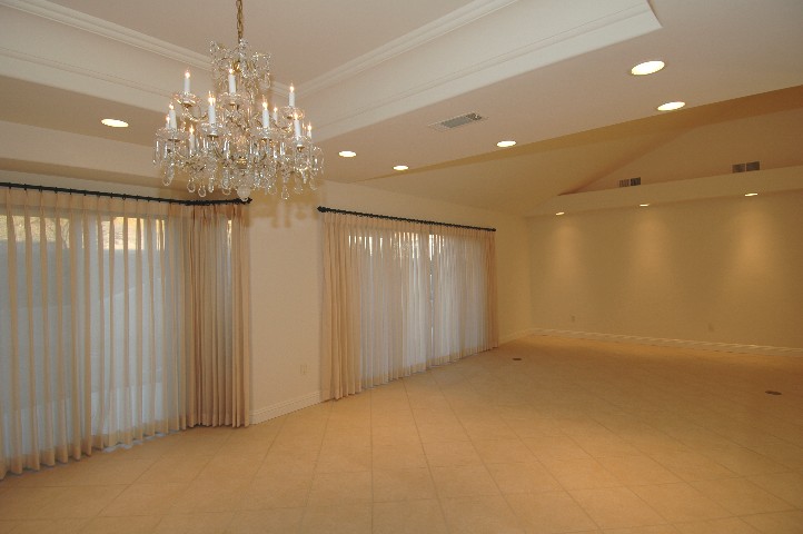 Elegant Coffered Ceiling and Crown Molding in Formal Dining..