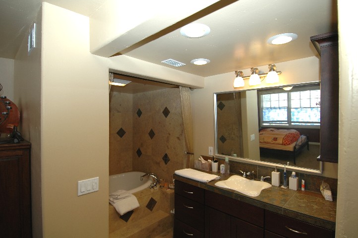 Stunning tile work in the romantic master suite bath...