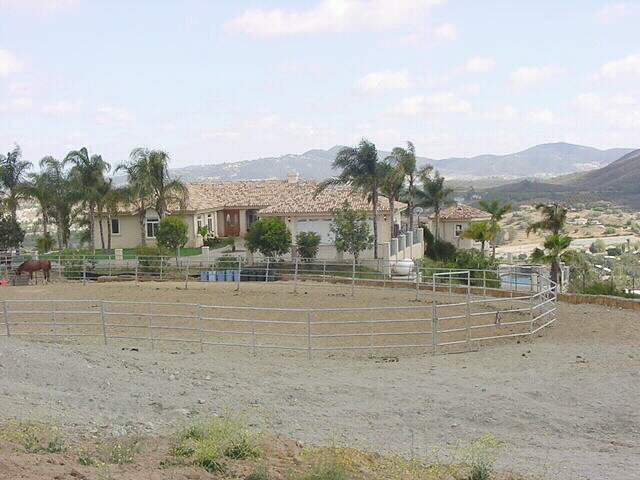 This Space behind the home... planned for Arena.. could easily be the Tennis Court