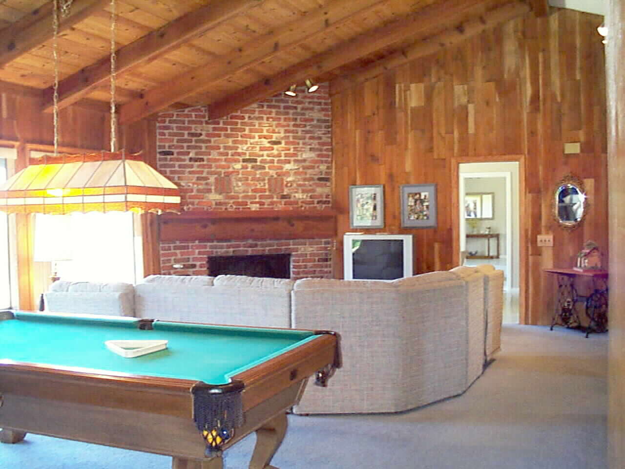 Now THIS is a Family room... bring your own chaulk.. the Pool Table & Light Stay