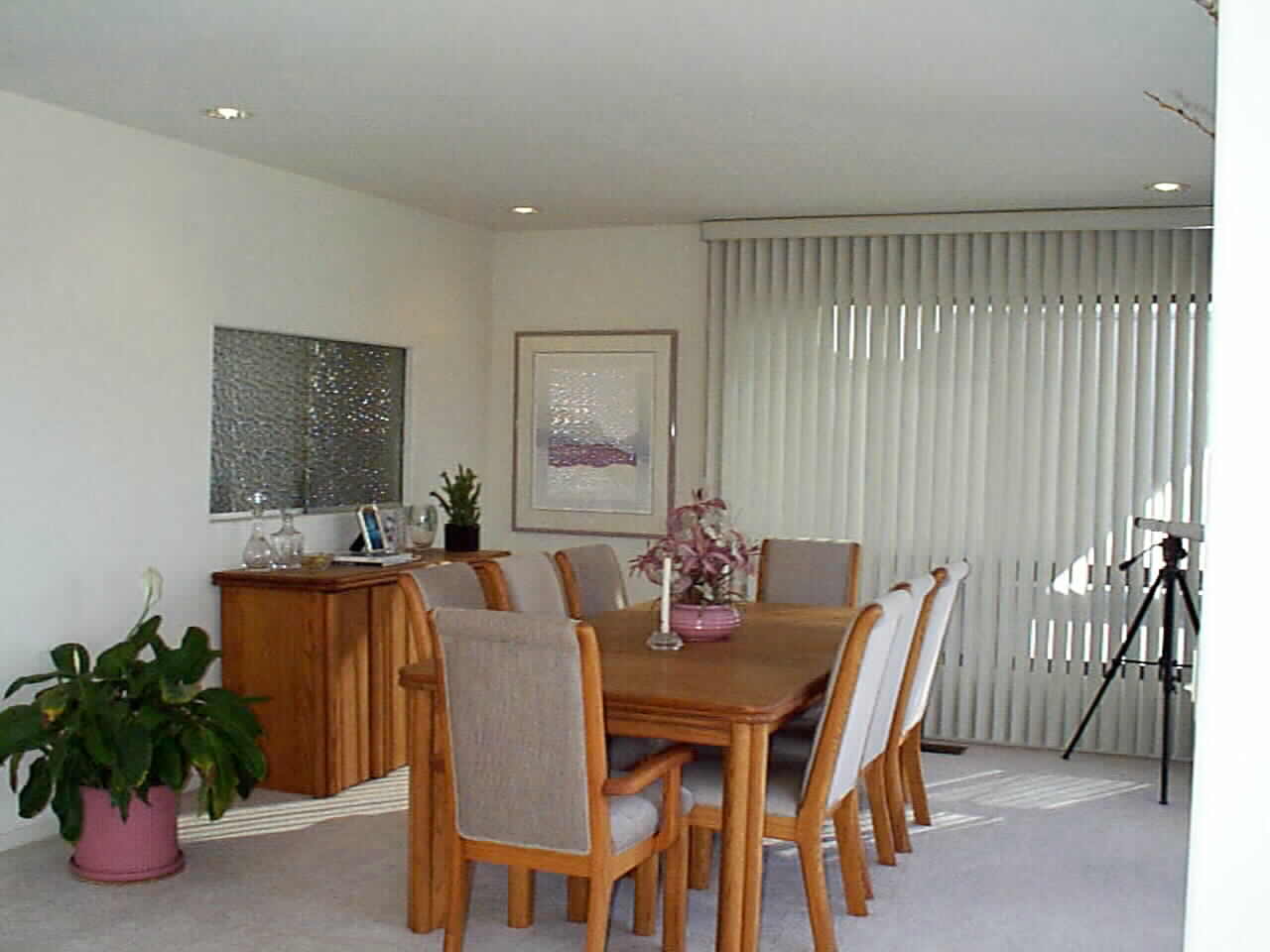 Formal Dining Room with Glass Doored Pass Through to Kitchen