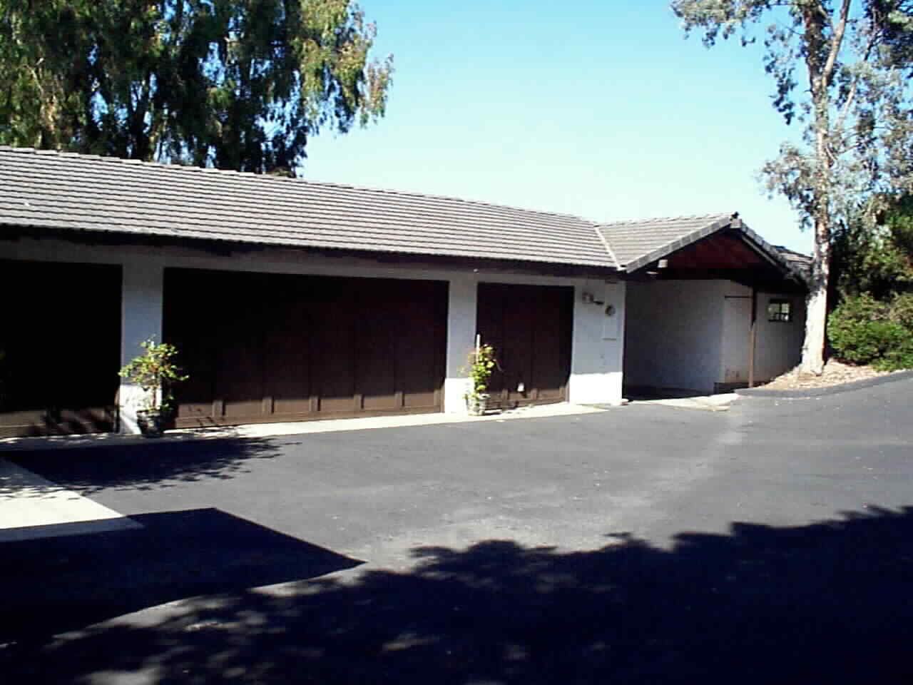 Bring on the toys.. 4 Car Attached Garage (Oversized), Covered RV Parking with Automotive Hoist & 2 Car Shop