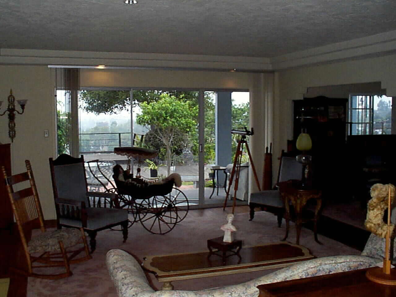 Living Room View.. under covered porch, over patio and pool to the Pacific Ocean