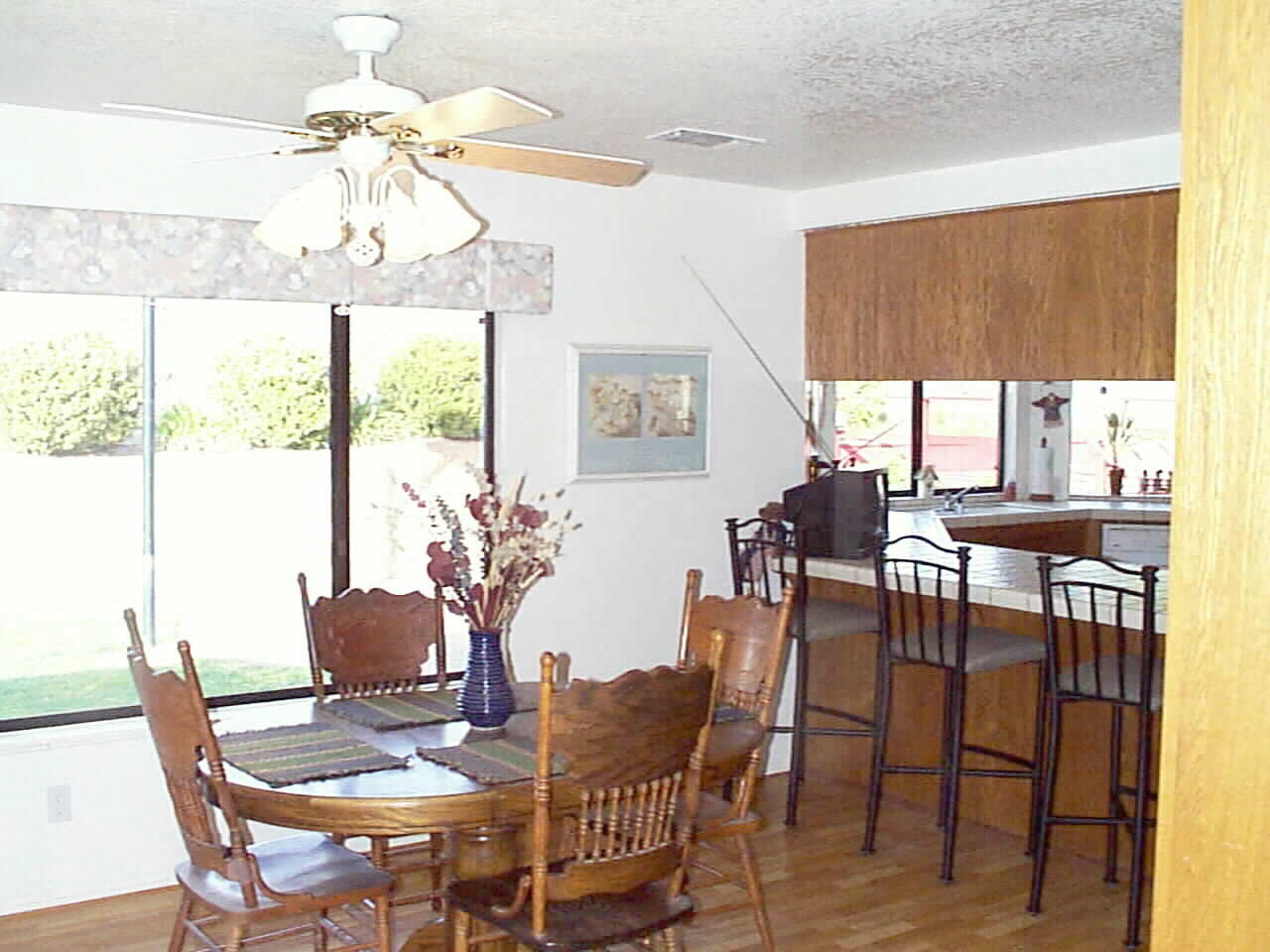 Family Sized... but Cozy Breakfast Nook with Counter seating and pass through to Food Central.