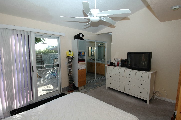 Spacious... Quiet... Private Master Suite with Sliding Door to Ocean Breezes