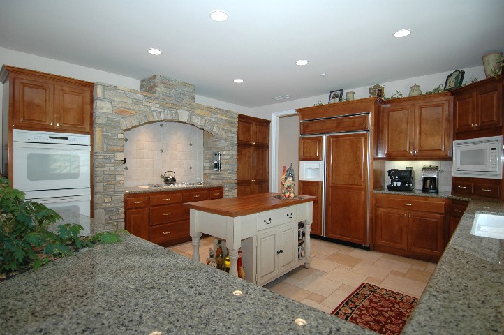 Miles of counter space... in Silver Sea Green Granite !